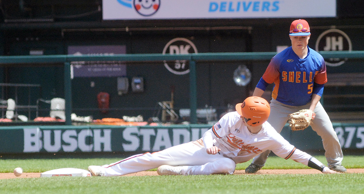 Bryce Payne (center) slides safely into second with a stolen base during Owensville’s 11-5 victory over the Roxana (Ill.) High School Shells in Saturday afternoon baseball at downtown St. Louis’ Busch Stadium. OHS is now 2-0 in games at Busch Stadium with their first victory in the form of a 7-5 win over Cape (Girardeau) Central back in May, 1992.
